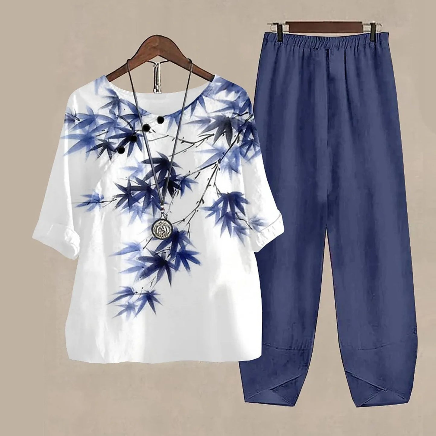 Elegant Printed Pantsuit, Round Neck Three Quarter Sleeve Tops Loose Bottom Pants